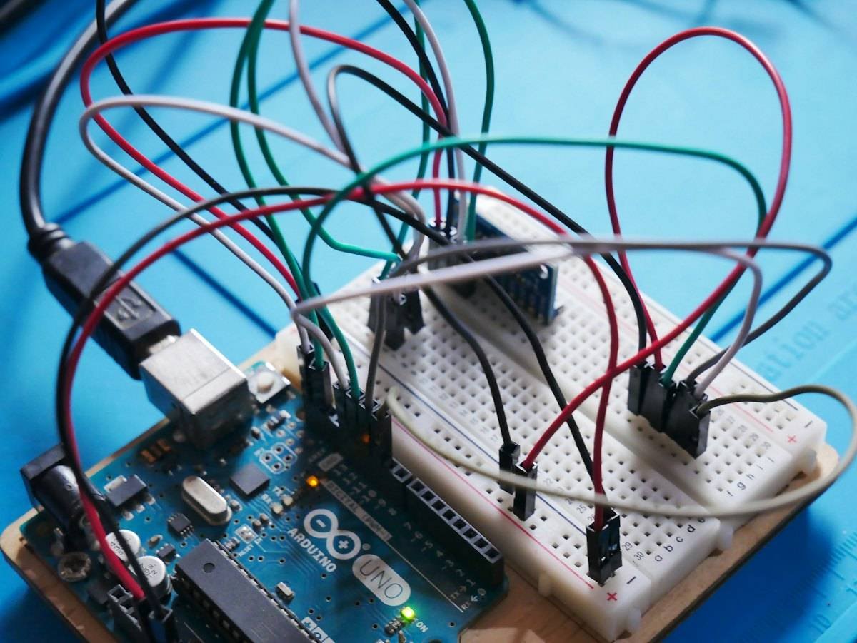 Arduino board wired to a breadboard prototype